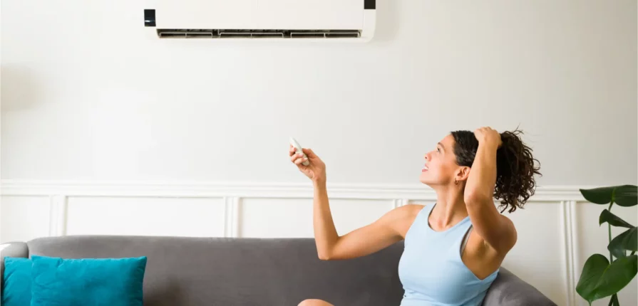 Prevent AC breakdowns this Summer with EMCO Tech - Woman has a broken AC