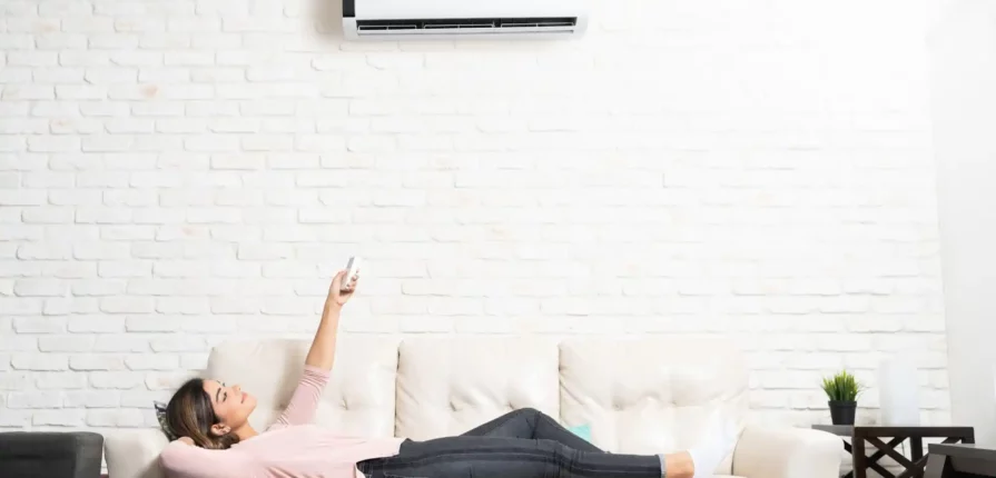 Choosing the right Ductless Mini-Split - happy customer enjoying new ductless mini split system